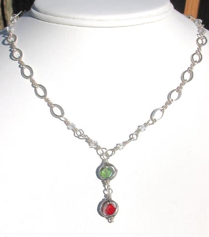 sterling sliver necklace with drop featuring Swarovski crystal birthstones