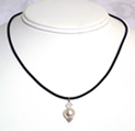 Swarovski Pearl and crystal pendant on black rubber necklace