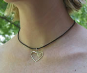 han forged sterling silver heart on black rubber cord necklace
