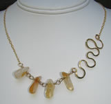 gold filled asymetrical hand forged necklace with freeform citrine beads