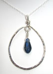 sterling silver hammered teardrop pendant with kyanite accent inside