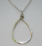sterling silver hand forged teardrop pendant