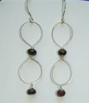 large sterling silver link earring with red tiger's eye bead in center