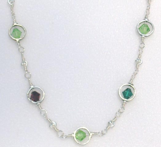 birthstone mother's necklace.  The birth stones of your choice surrounded by sterling silver.