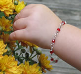 child's birthstone bracelet on handmade sterling silver chain